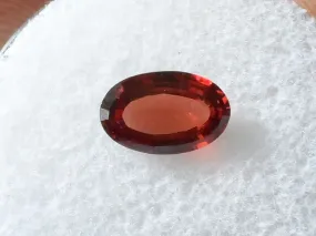 1.33CTS. RED/ORANGE GARNET OVAL CUT, MONTANA