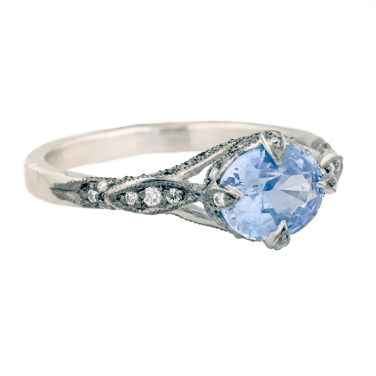 Platinum and Blue Sapphire Petal Side Ring