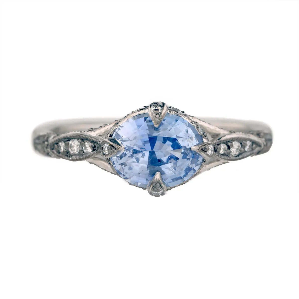 Platinum and Blue Sapphire Petal Side Ring